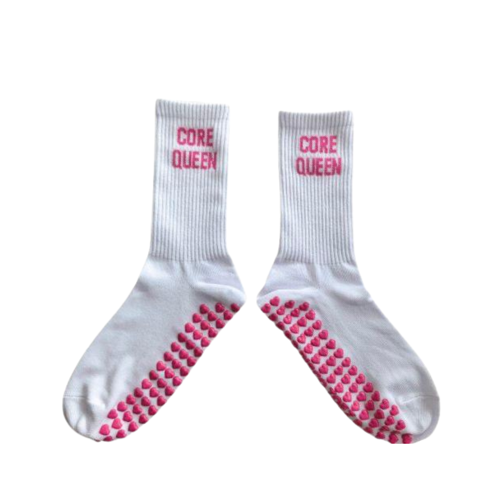 White socks with pink text 'Core Queen' and sole pattern on a white background