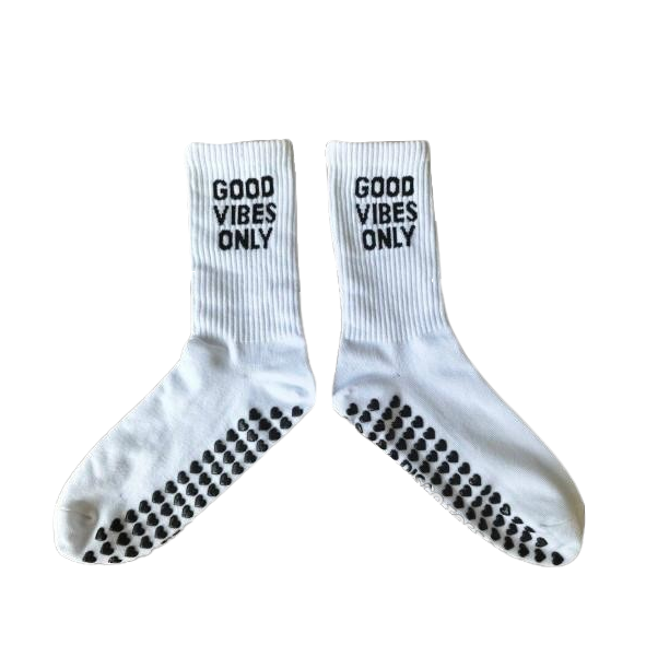 White socks with 'Good Vibes Only' text on a white background
