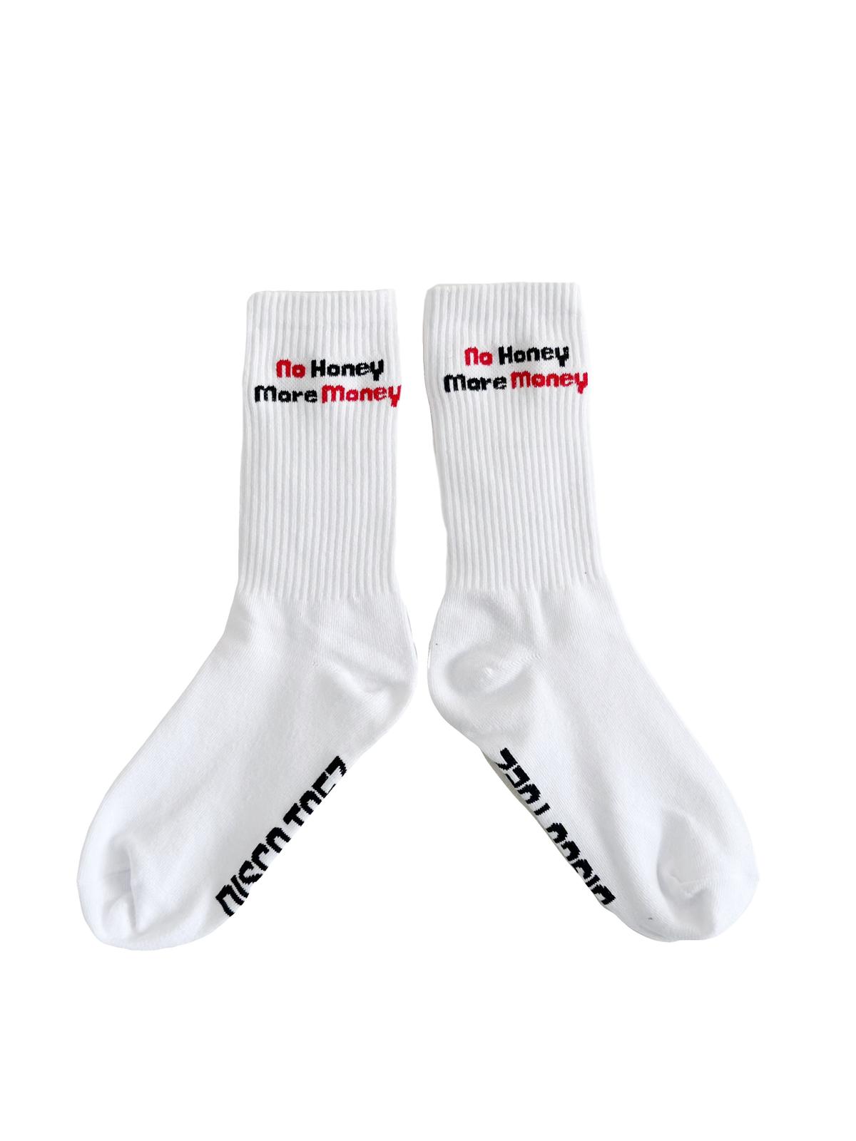 A pair of white socks with the text 'no honey more money' on a white background