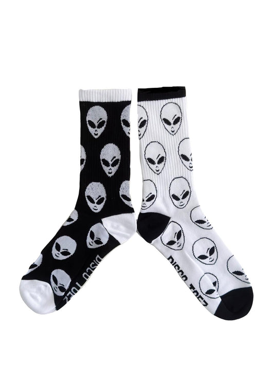 A pair of black and white socks with an alien pattern