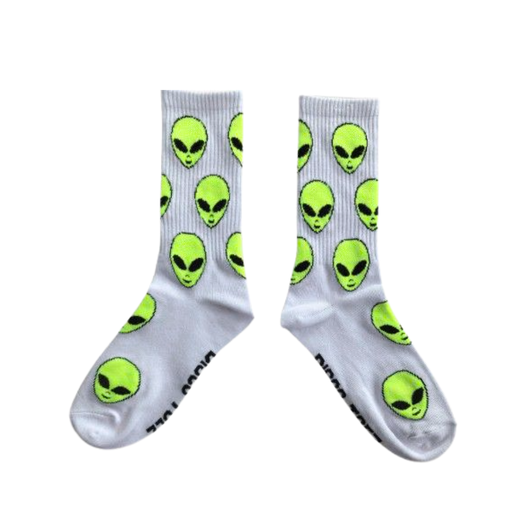 White socks with green alien faces pattern on a white background