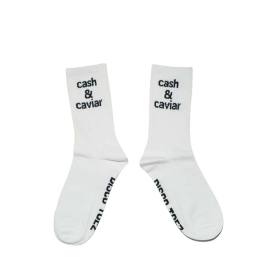 White socks with 'cash & caviar' text on a white background