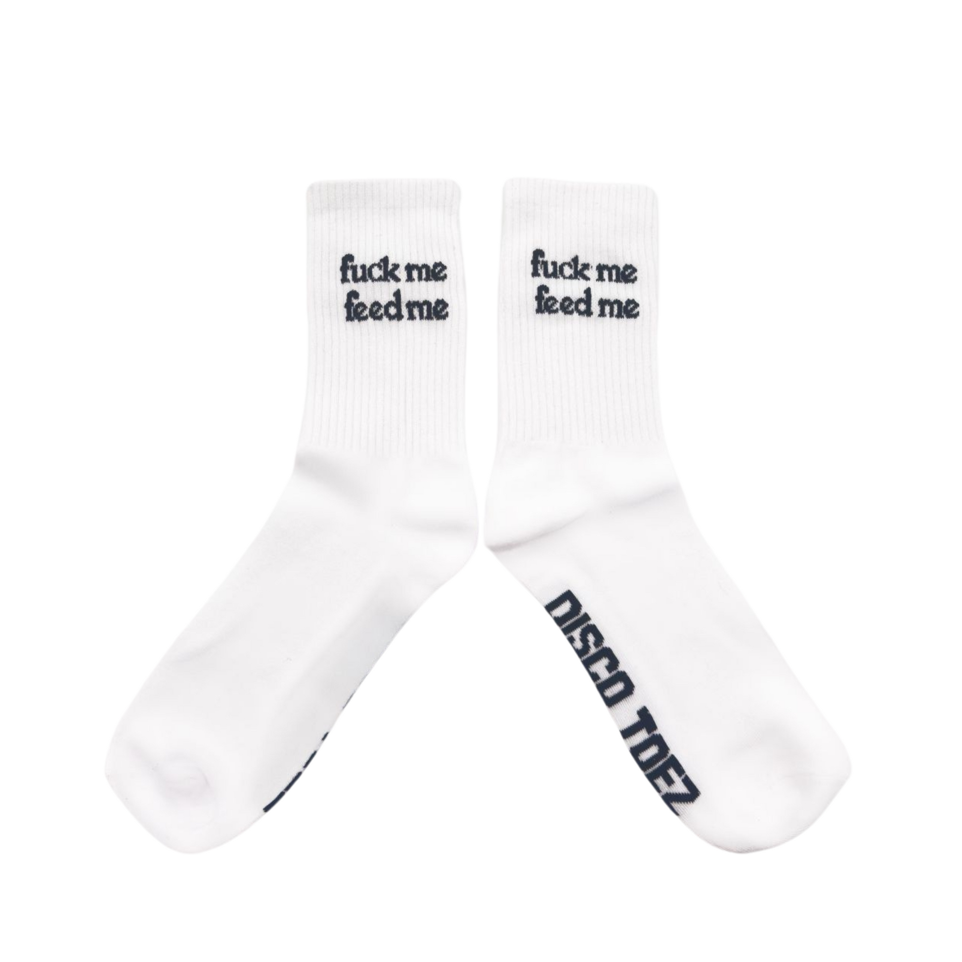 A pair of white socks with black text 'Fuck Me, Feed Me' on a white background