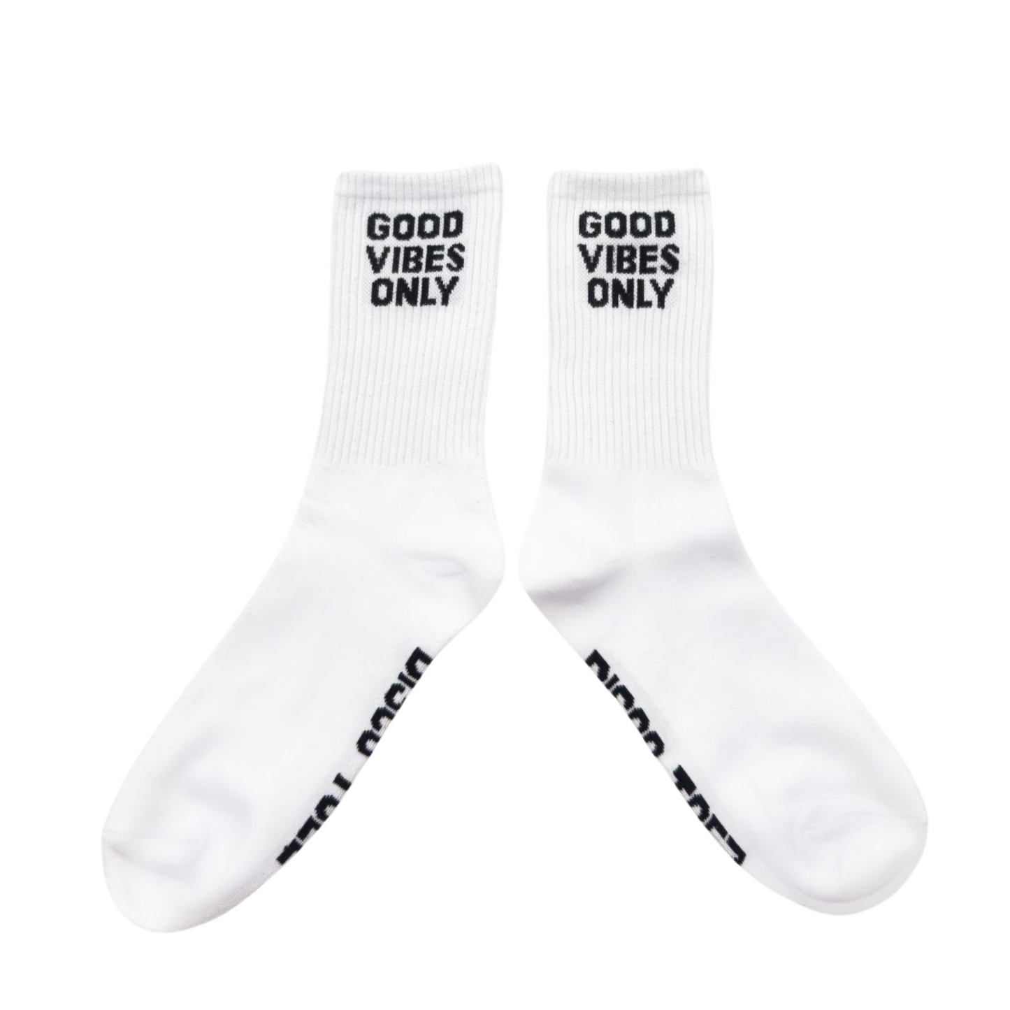 a pair of white socks with black text 'good vibes only' on a white background