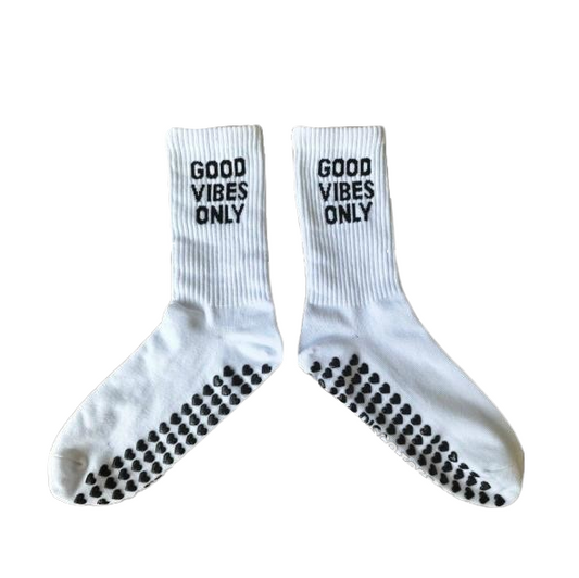 White socks with 'Good Vibes Only' text on a white background