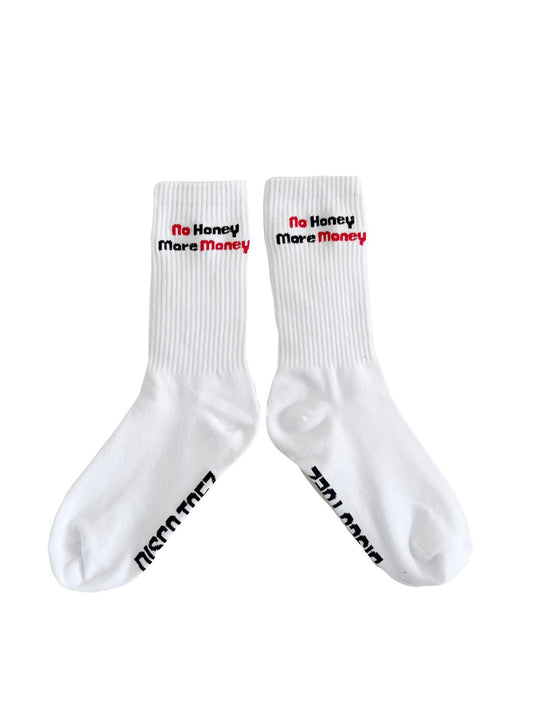 A pair of white socks with the text 'no honey more money' on a white background
